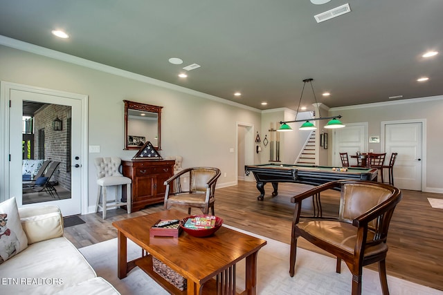 playroom featuring ornamental molding, pool table, and hardwood / wood-style floors