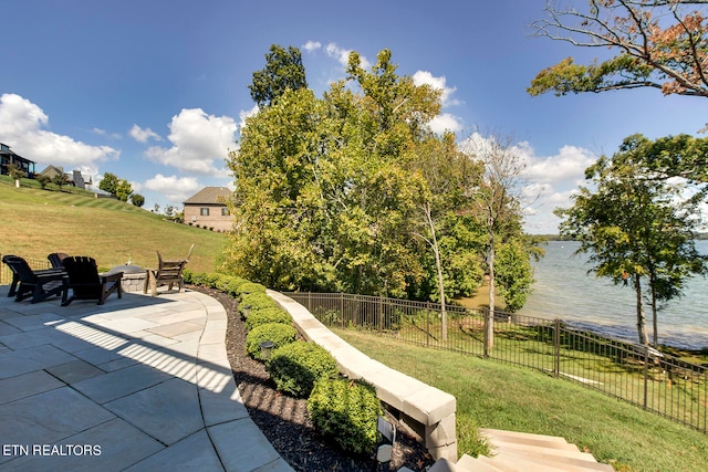 view of patio / terrace featuring a water view