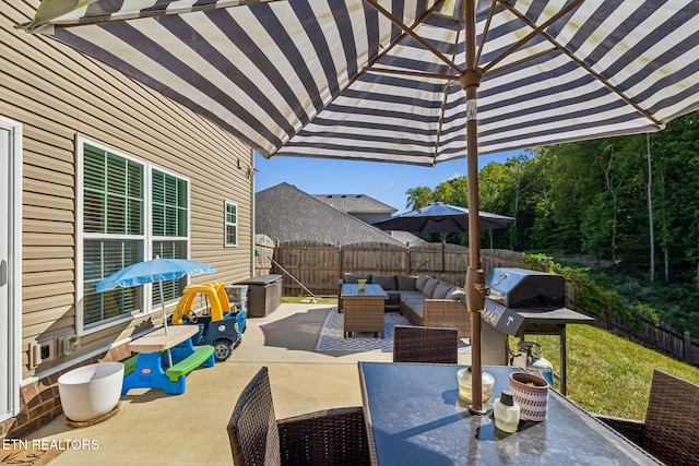 view of patio / terrace featuring an outdoor living space and a grill