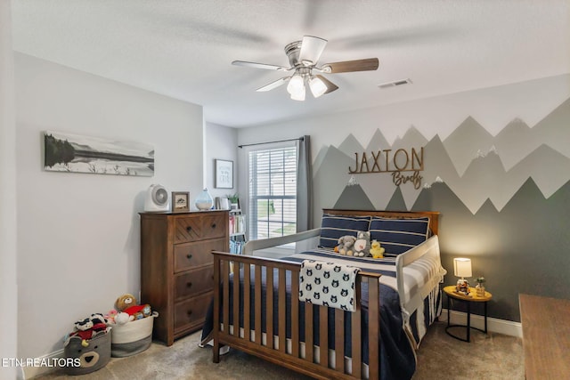 carpeted bedroom featuring ceiling fan