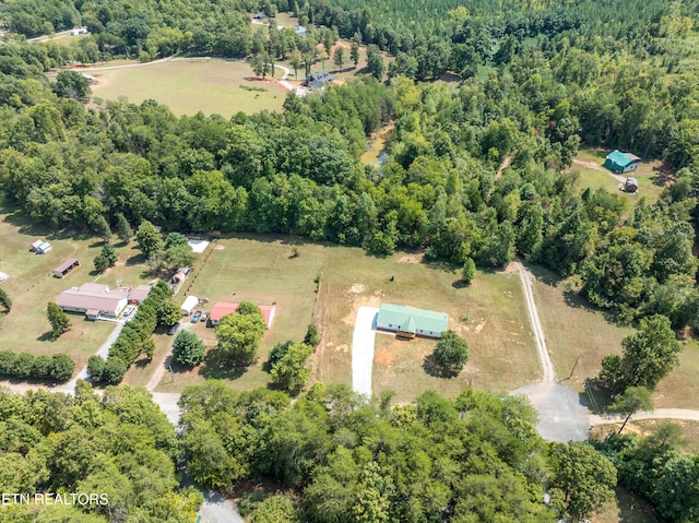 aerial view with a view of trees and a rural view