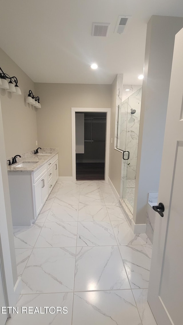 bathroom featuring plus walk in shower and vanity