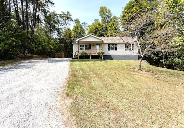 view of front of home with a front lawn and covered porch