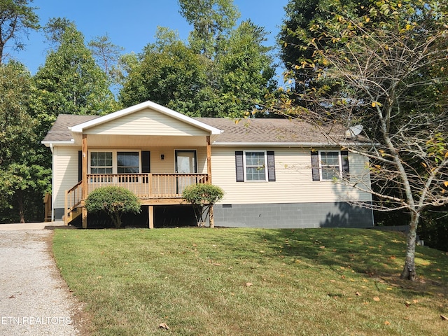 view of front of home with a porch and a front yard