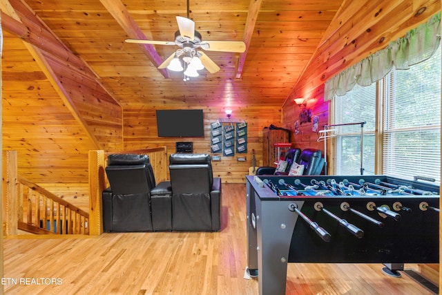 playroom with lofted ceiling, ceiling fan, hardwood / wood-style flooring, and wood ceiling