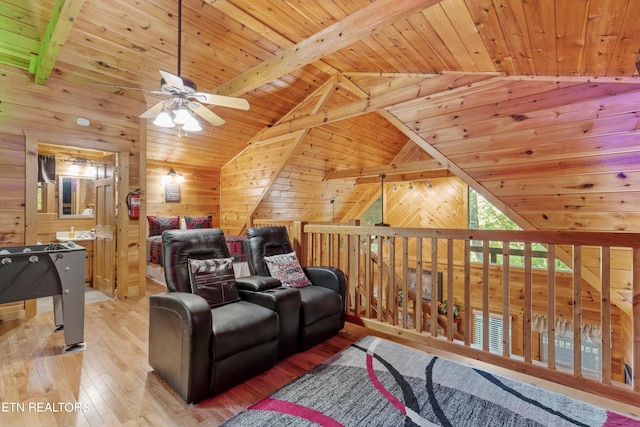 interior space featuring wooden ceiling, lofted ceiling with beams, ceiling fan, and light hardwood / wood-style floors