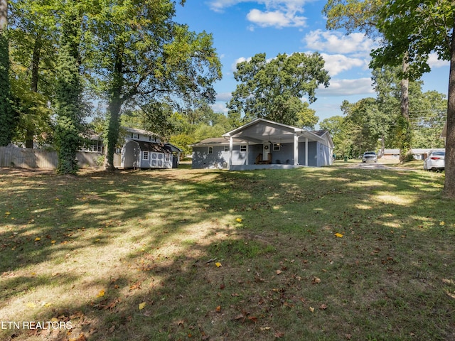 view of yard with a shed