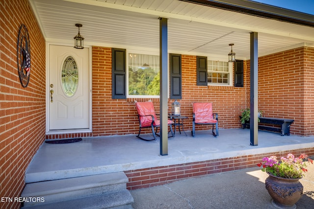 view of patio featuring a porch