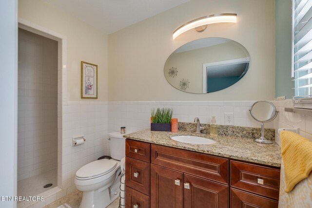 bathroom featuring walk in shower, decorative backsplash, vanity, and toilet