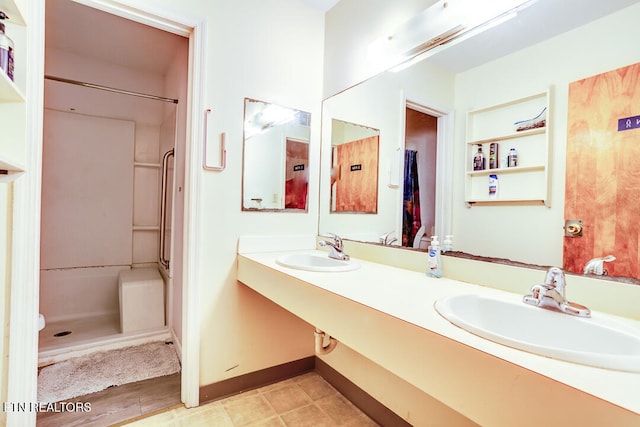 bathroom with vanity and hardwood / wood-style flooring