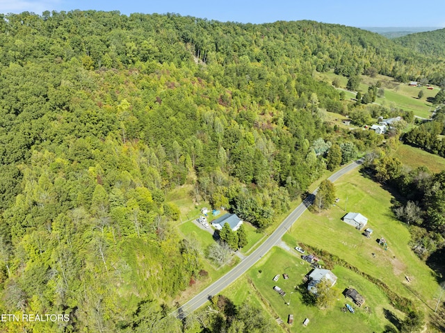 drone / aerial view with a forest view