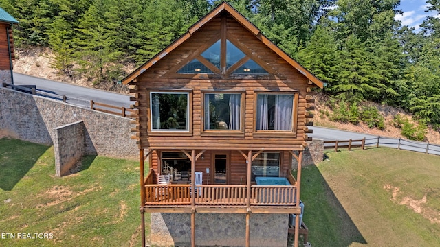 view of front of home with a front lawn and covered porch