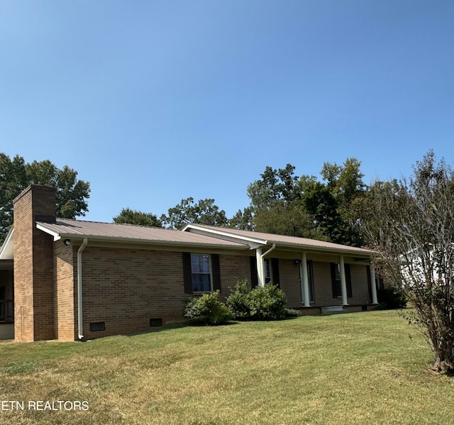 single story home with a front yard