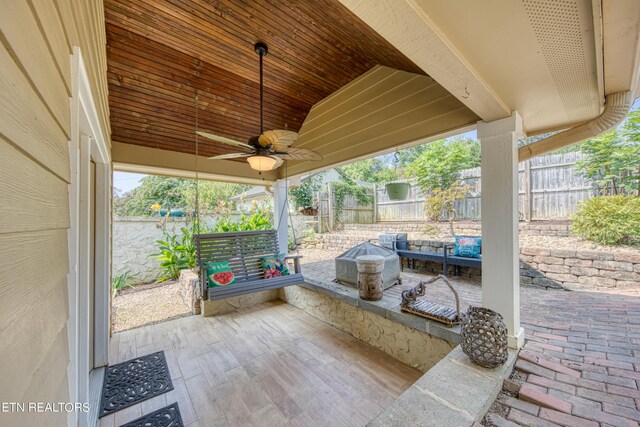 view of patio with ceiling fan