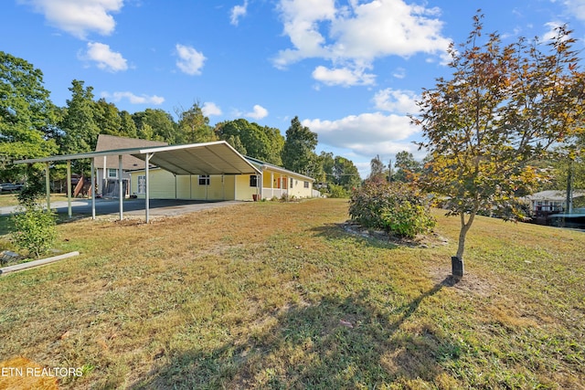 view of yard with a carport