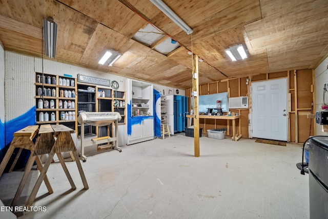 basement with a workshop area