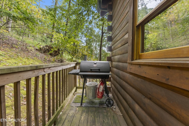 wooden terrace with grilling area