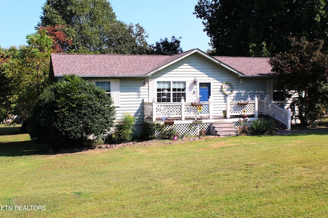 ranch-style house with a front lawn