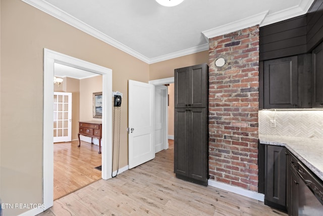 kitchen featuring backsplash, ornamental molding, light hardwood / wood-style flooring, and light stone counters