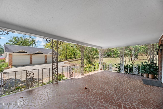 view of patio / terrace with a garage