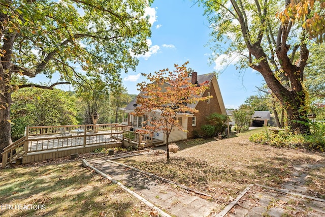 view of yard with a deck