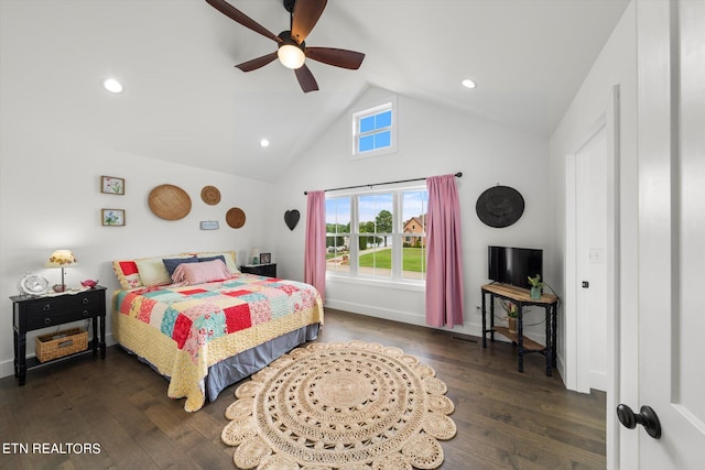 bedroom featuring dark wood-type flooring, lofted ceiling, and ceiling fan