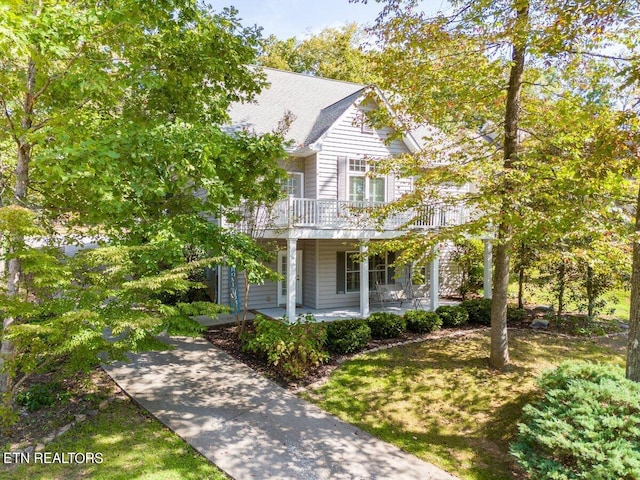 view of front of property with a balcony