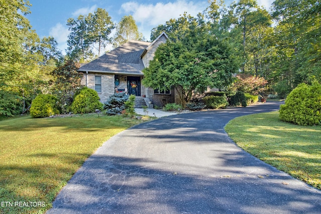 view of front of house with a front lawn