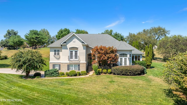 155 Killdeer Dr, Vonore, TN 37885 - view of front of house featuring french doors, a front yard, and stucco siding