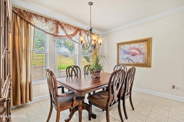 155 Killdeer Dr, Vonore, TN 37885 - dining room featuring ornamental molding, light tile patterned flooring, a notable chandelier, and baseboards