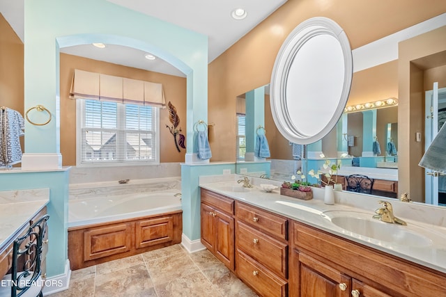 155 Killdeer Dr, Vonore, TN 37885 - bathroom with double vanity, a sink, a garden tub, and recessed lighting