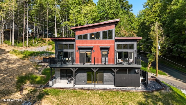 back of house featuring a patio area