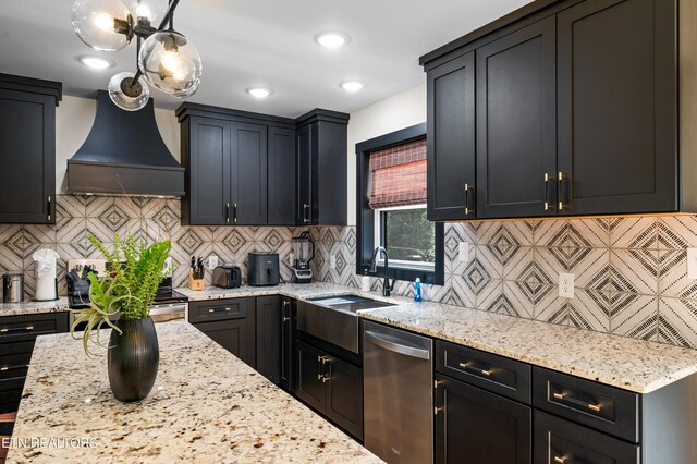 kitchen with stainless steel appliances, sink, decorative backsplash, and custom exhaust hood