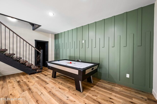 rec room featuring light hardwood / wood-style floors