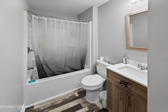 full bathroom with hardwood / wood-style flooring, vanity, toilet, and shower / bath combination with curtain