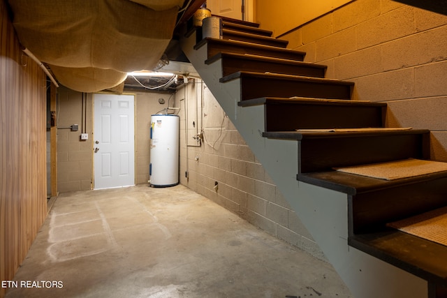 basement featuring electric water heater