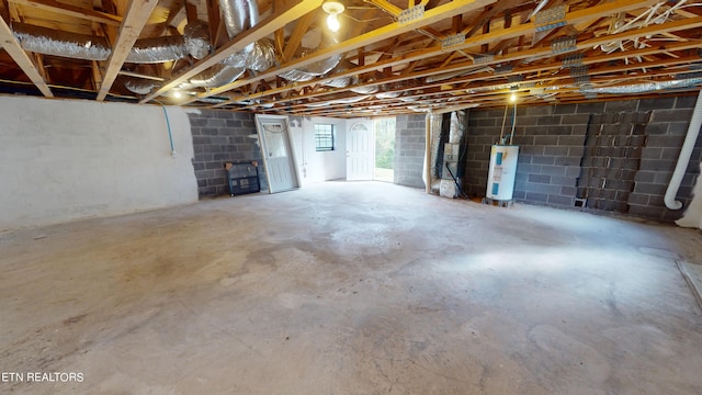 basement featuring water heater