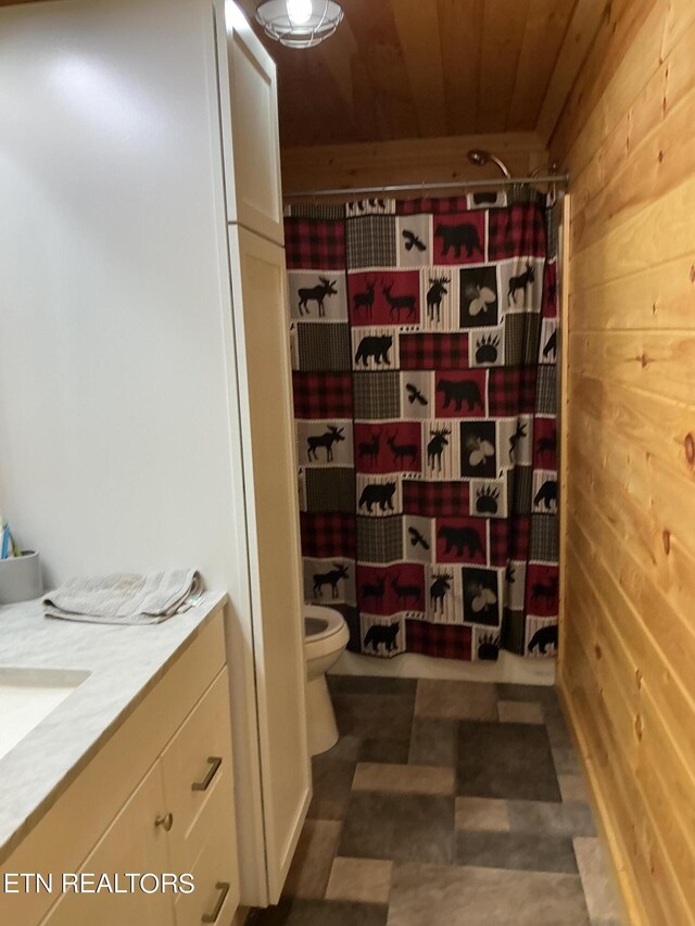 bathroom featuring wood walls, toilet, wood ceiling, vanity, and a shower with curtain