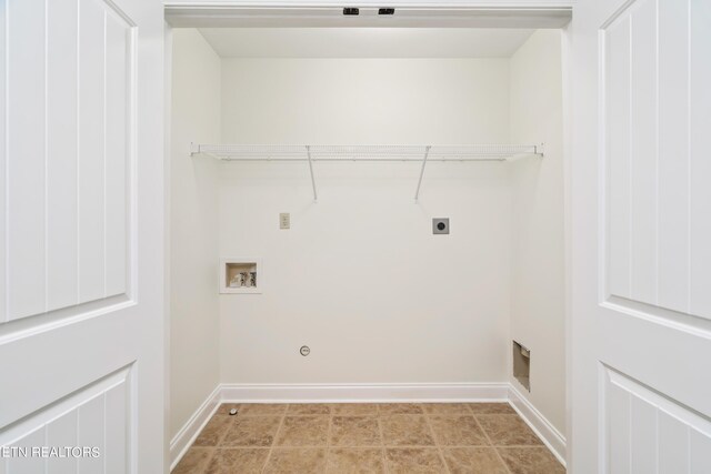 washroom with hookup for a washing machine and hookup for an electric dryer