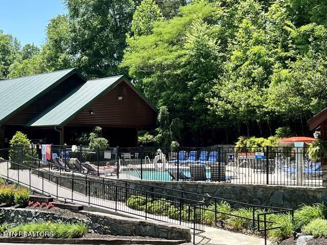 view of community featuring a swimming pool