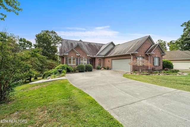 ranch-style house with a garage and a front yard