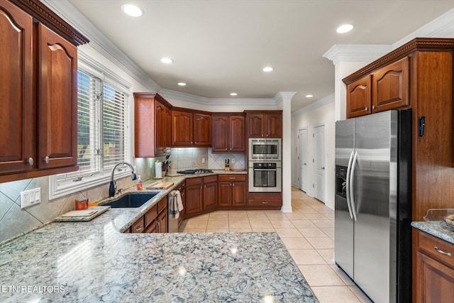 kitchen with decorative backsplash, sink, light tile patterned floors, and stainless steel appliances