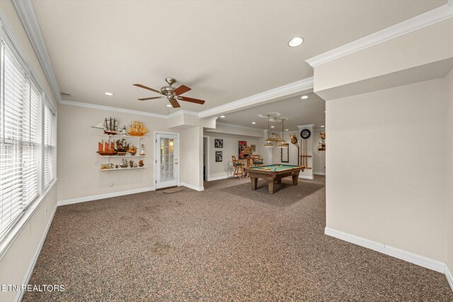 unfurnished living room with carpet floors, ornamental molding, ceiling fan, and billiards