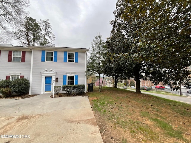 view of front of home with a front lawn