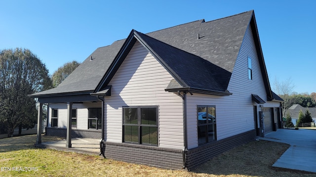 view of home's exterior featuring a garage