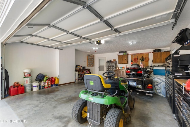 garage featuring a garage door opener