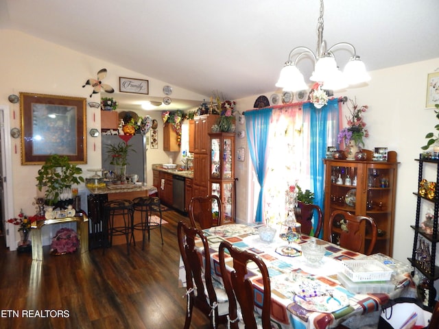 dining area with vaulted ceiling and dark hardwood / wood-style flooring