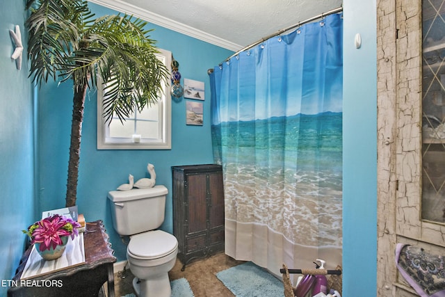 bathroom with toilet, a textured ceiling, and ornamental molding