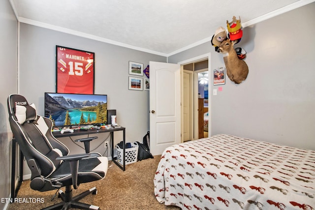 bedroom with crown molding and carpet floors