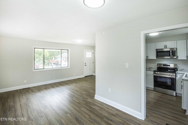 interior space featuring dark wood-type flooring